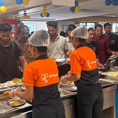 SLP service team plating meals at the counter